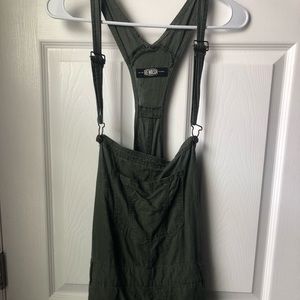 Lightly distressed green overalls